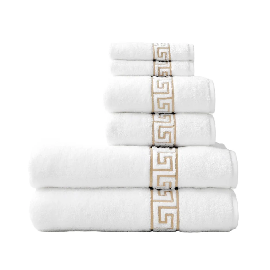 White towels with decorative gold borders